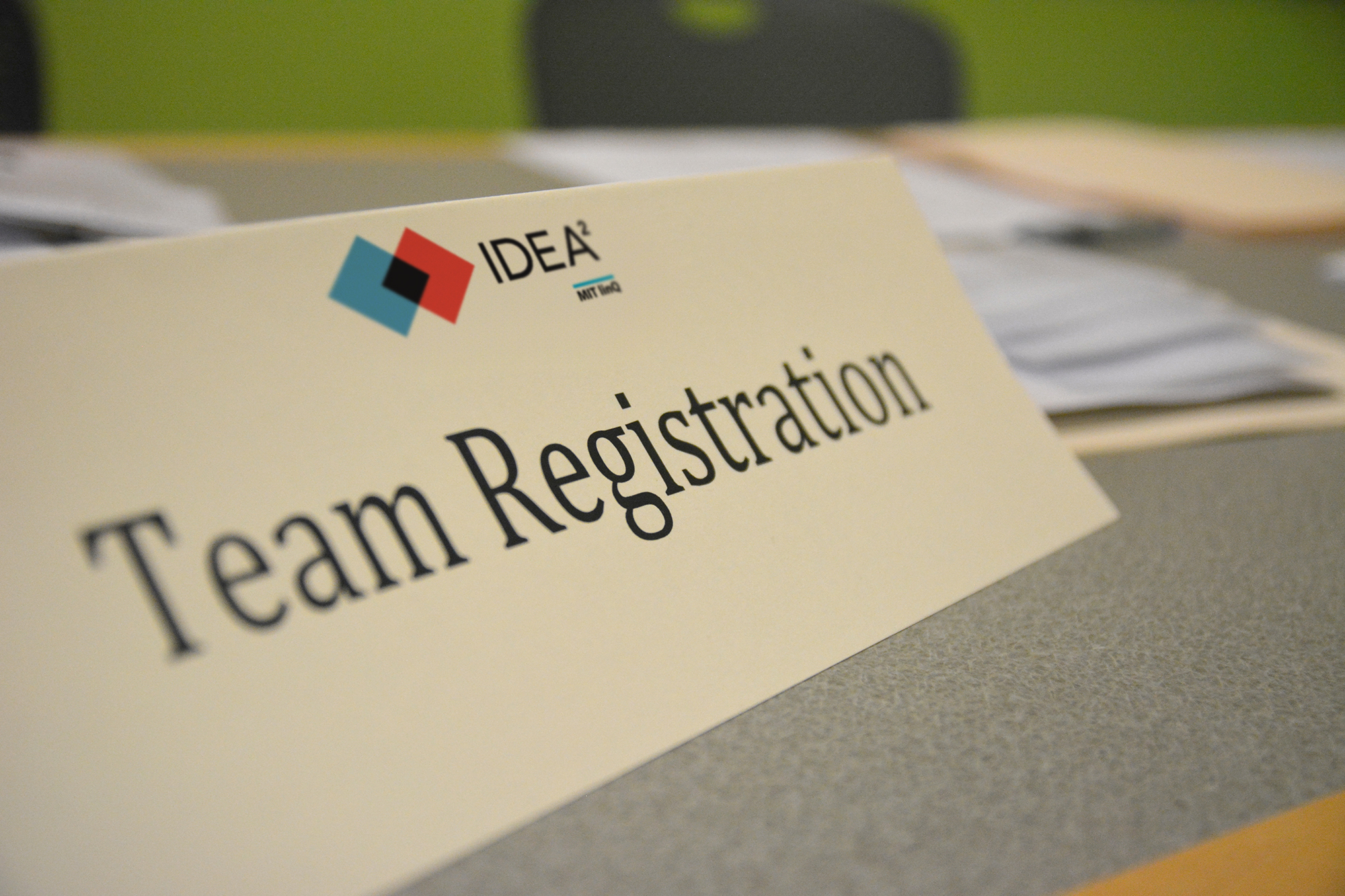 Desk placard with IDEA2 logo and title Team Registration